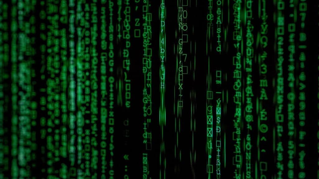 A screen of falling code from the Matrix Movie
