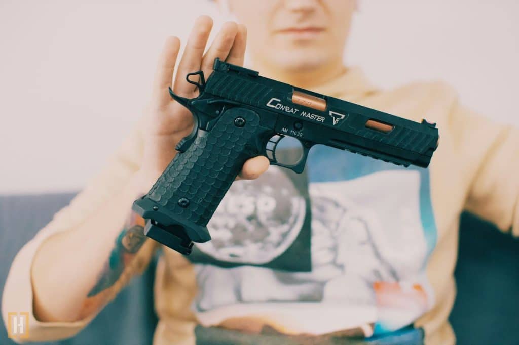Man showing off his gun