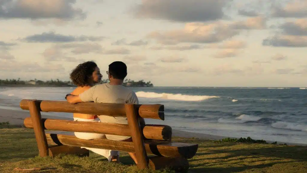 A couple enjoys peaceful silence together, reflecting emotional ease and comfort.