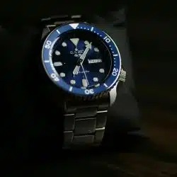 A close-up photo of a Seiko 5 watch with a blue dial.
