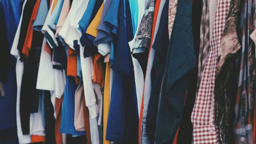 A rack displaying oversized, frumpy clothes.