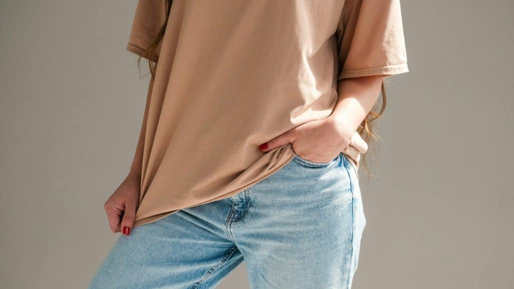 A woman wearing oversized clothing.