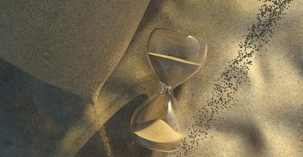An hourglass on the ground.