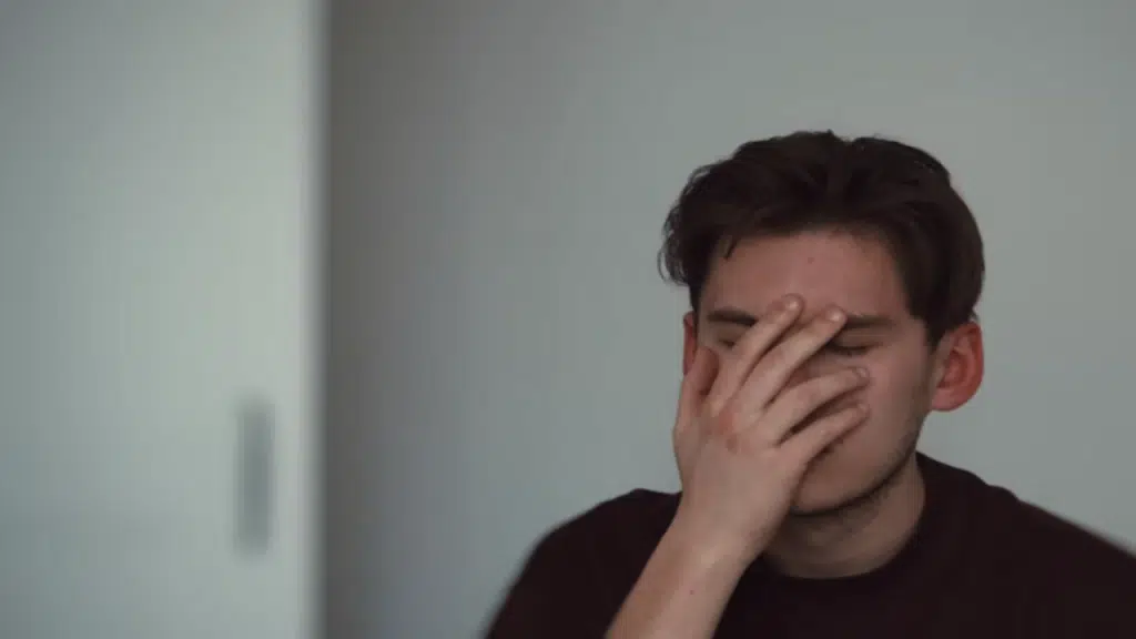 A man face-palming.