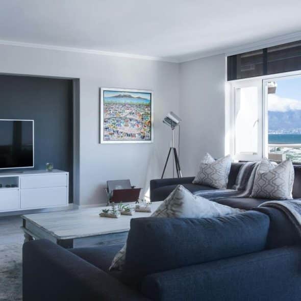 Navy blue-themed living room
