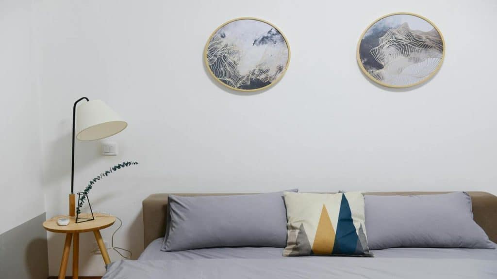 A living room with a colorful throw