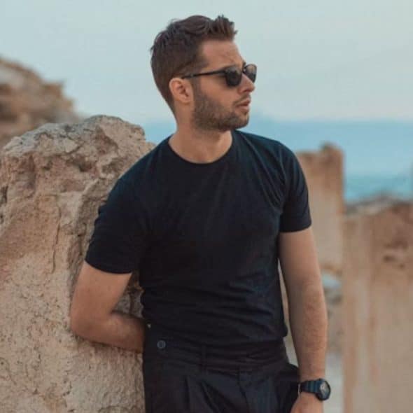 Man taking a quiet moment to reflect on his emotional state alone