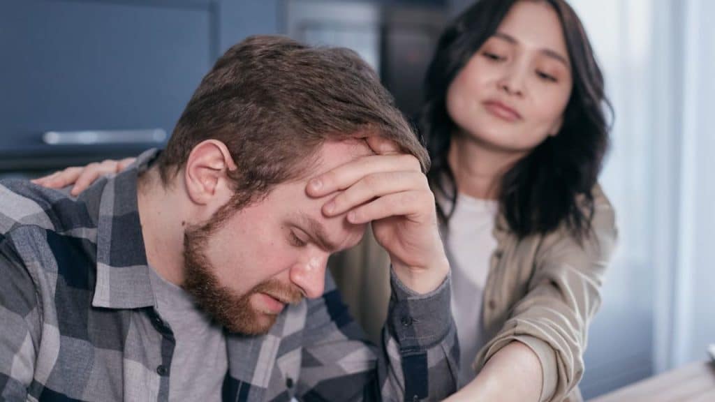 Man confidently expressing emotion in a one on one conversation