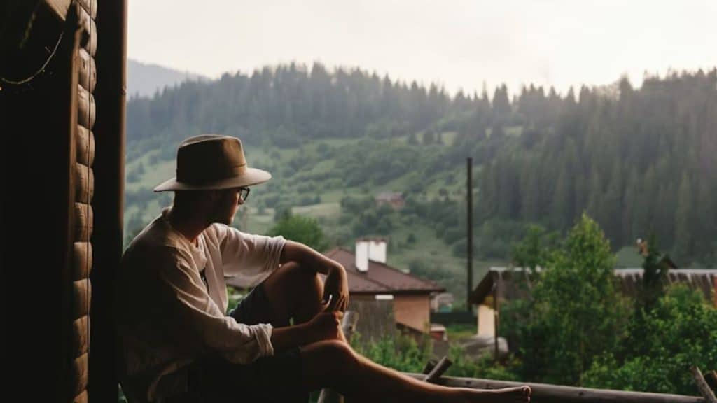 Man reflecting alone in a quiet, calming environment as part of emotional growth