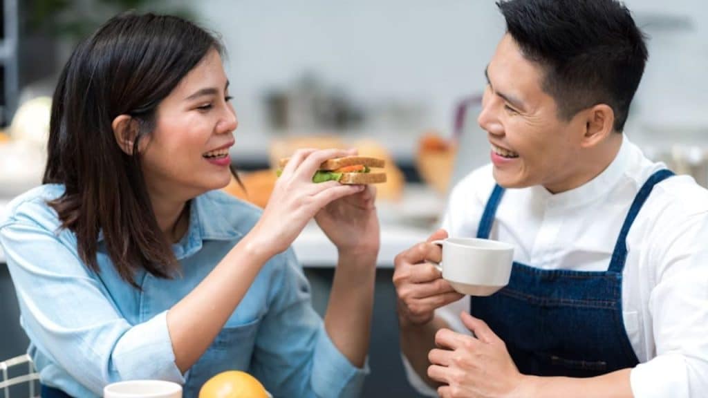 Man sharing his unique life experiences as a chef with his partner on their date