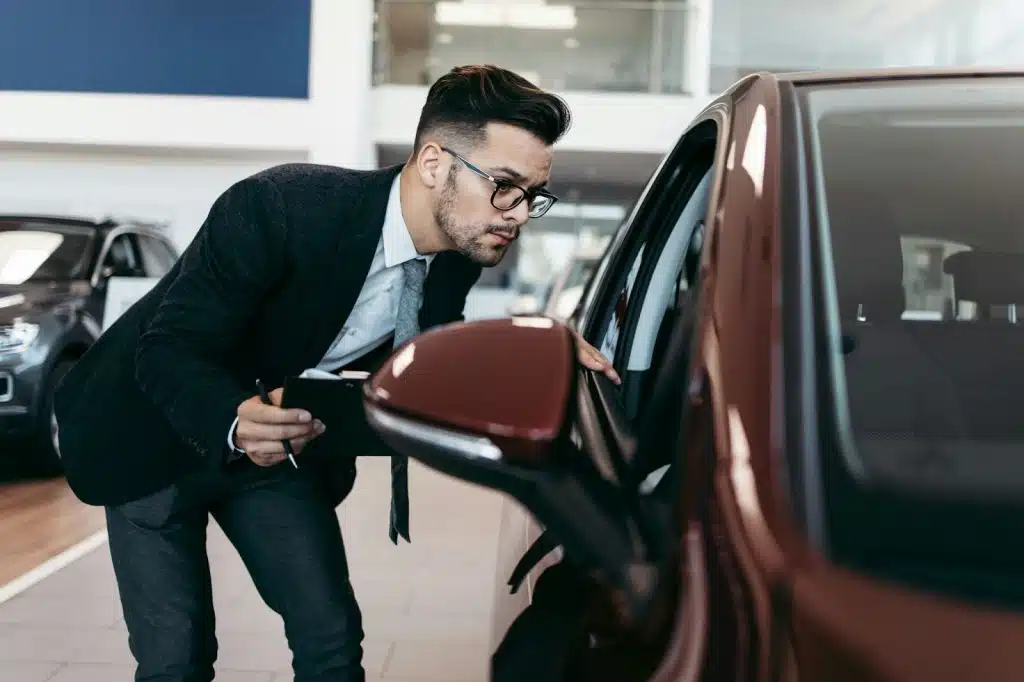 A checking on a car.