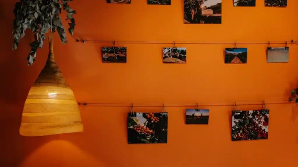 A DIY photo memory wall on a living room wall.