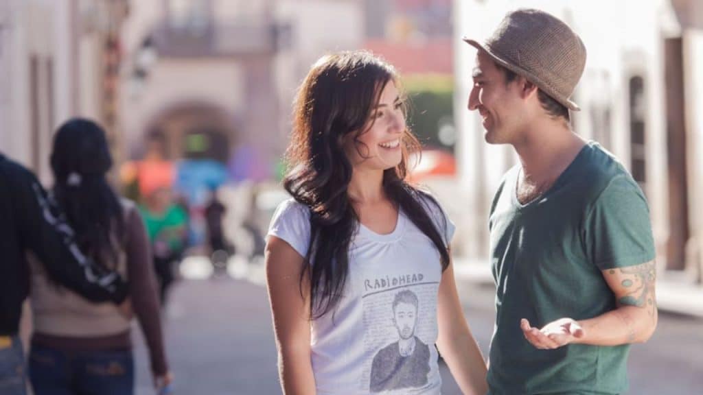 Couple discussing physical comfort levels in a warm and respectful way.