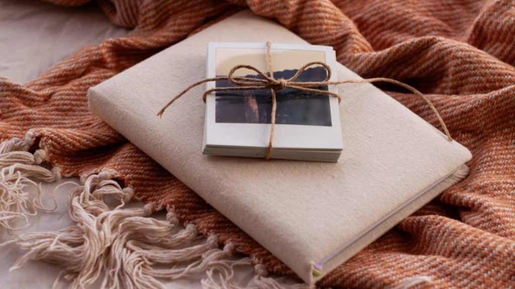 A shared journal gift and photos that encourages emotional communication between partners.