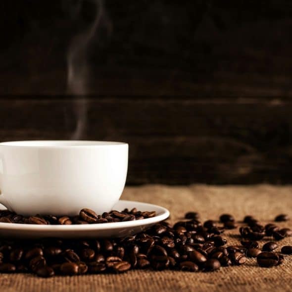 A picture of coffee and a coffee beans