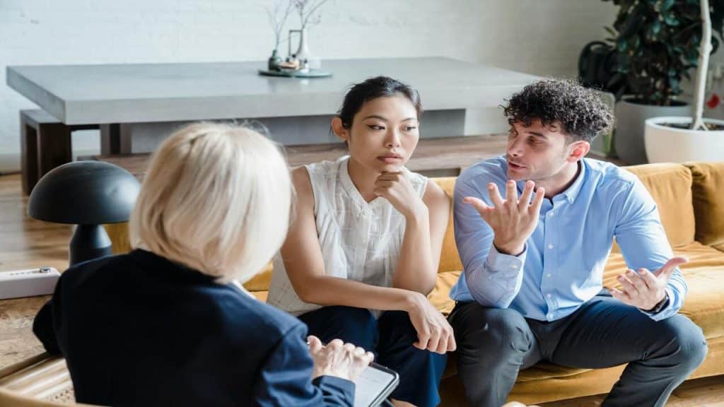 A couple arguing while in therapy.