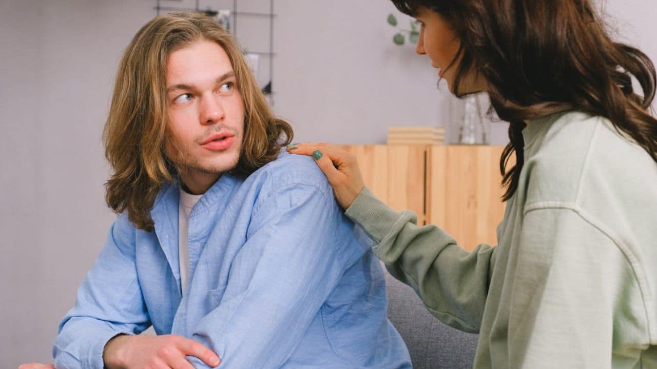 Man nodding while his partner shares thoughts during a peaceful conversation