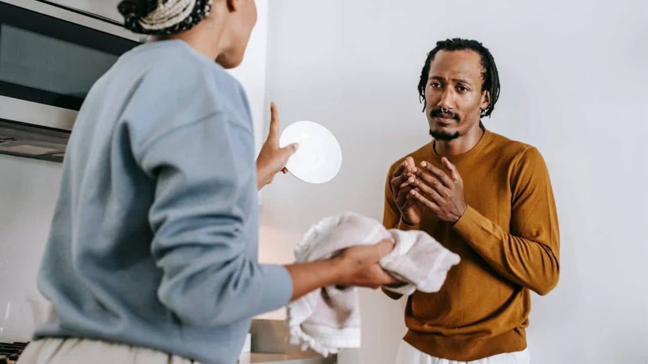 Man showing maturity and emotional responsibility by apologizing sincerely.