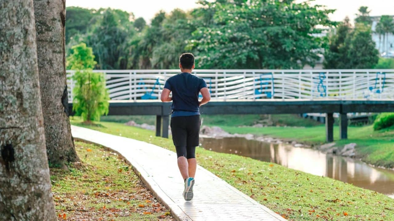 Man going for a walk or run to clear his mind.