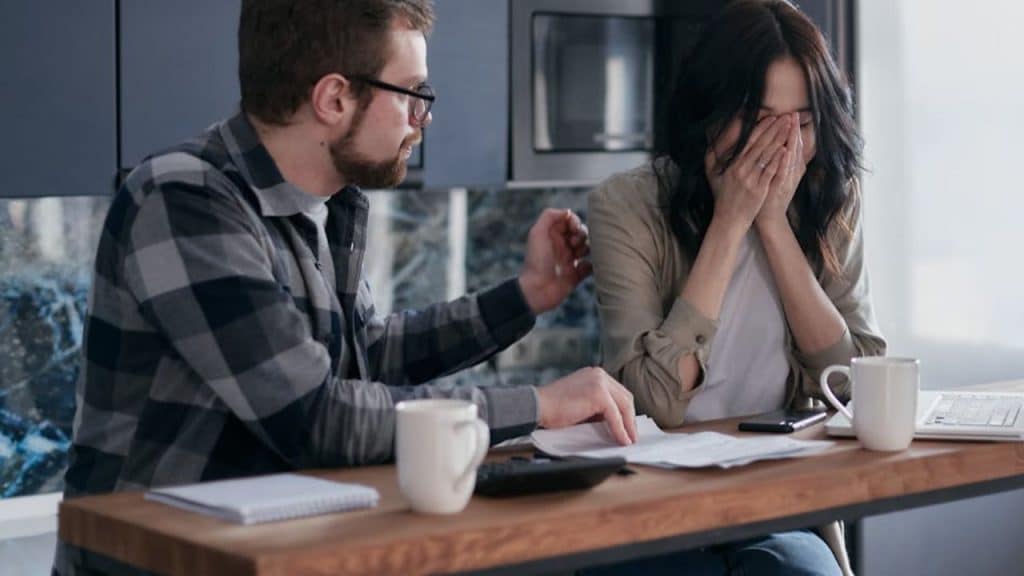 Man listening quietly and respectfully while his ex speaks out her emotion.