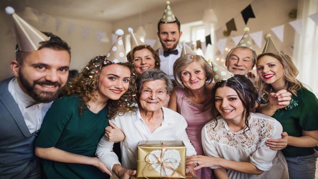A multigenerational family celebrating a birthday.