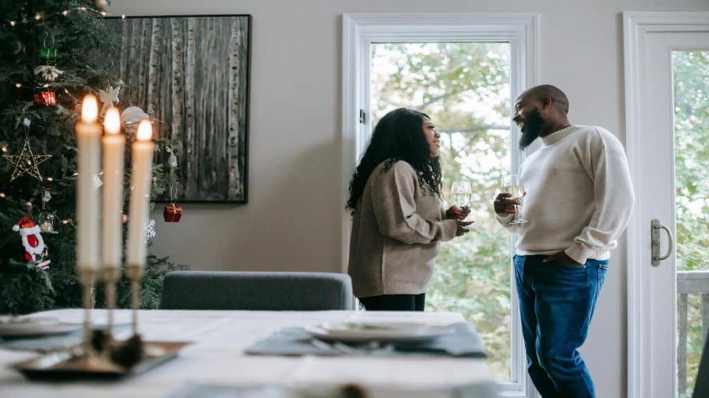 A couple talking at home during the holidays.