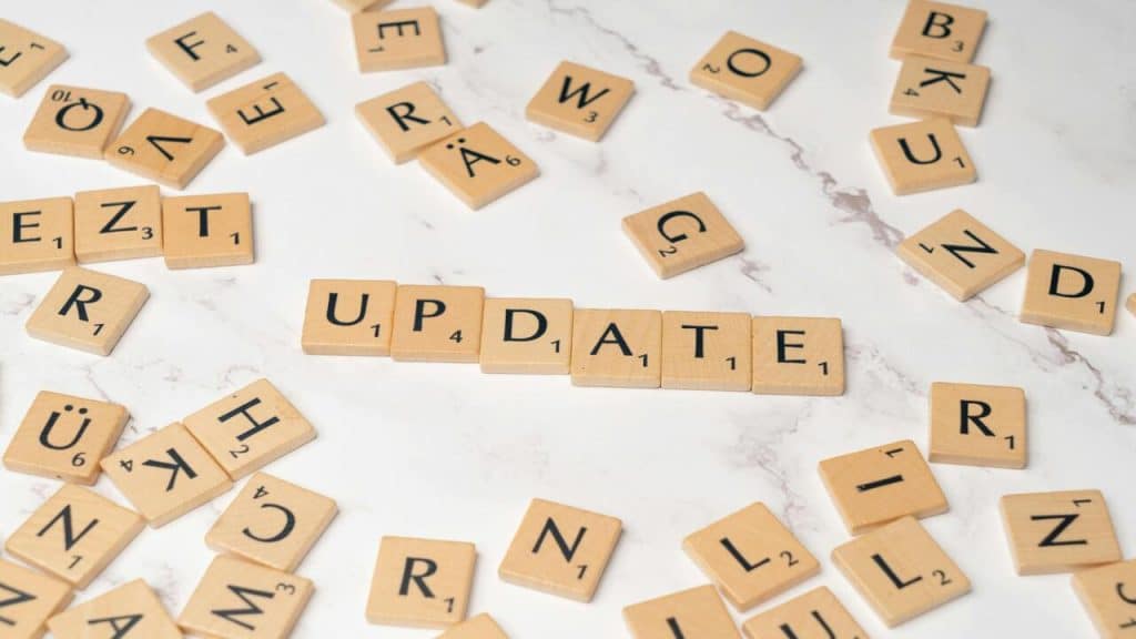 Scrabble letters spelling out “update”.