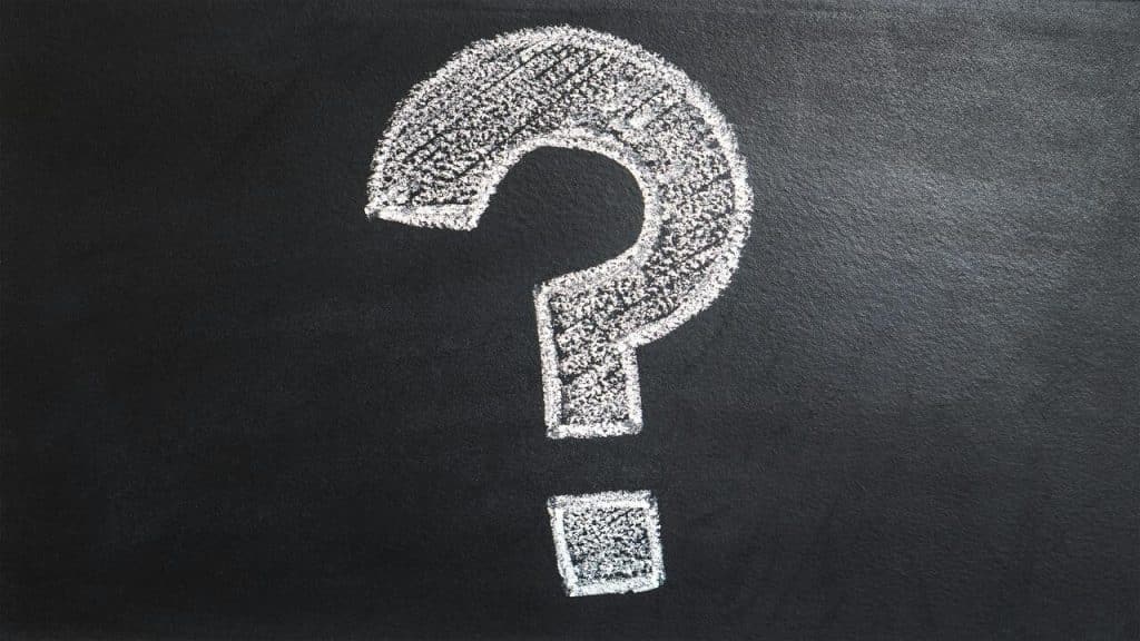 Question mark on a chalk board.