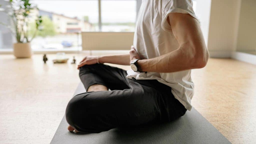 A man doing some breathing exercises.