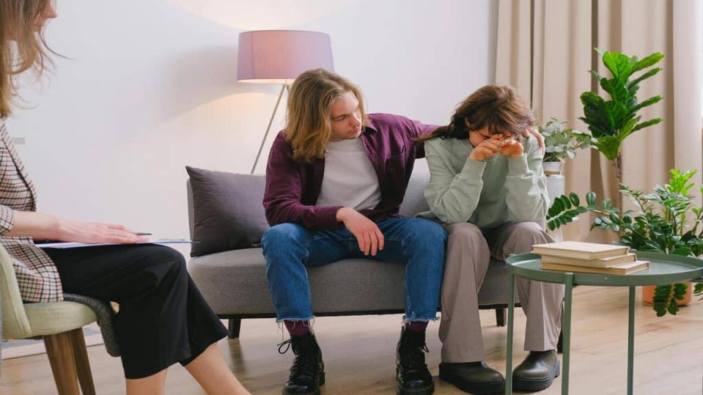A couple discussing their problems with a therapist.