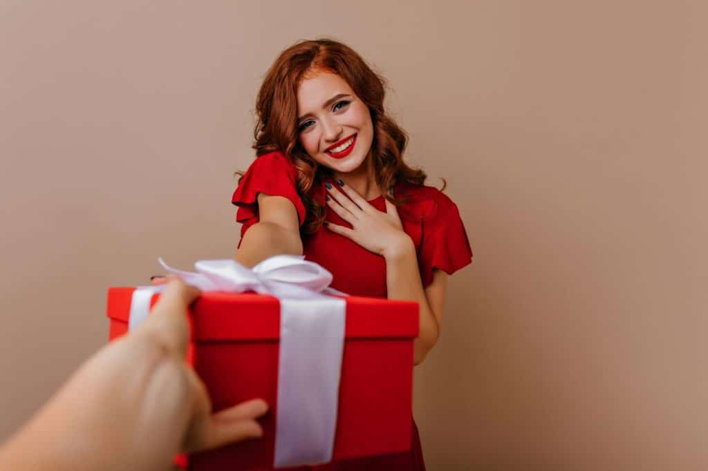 A woman receiving a gift