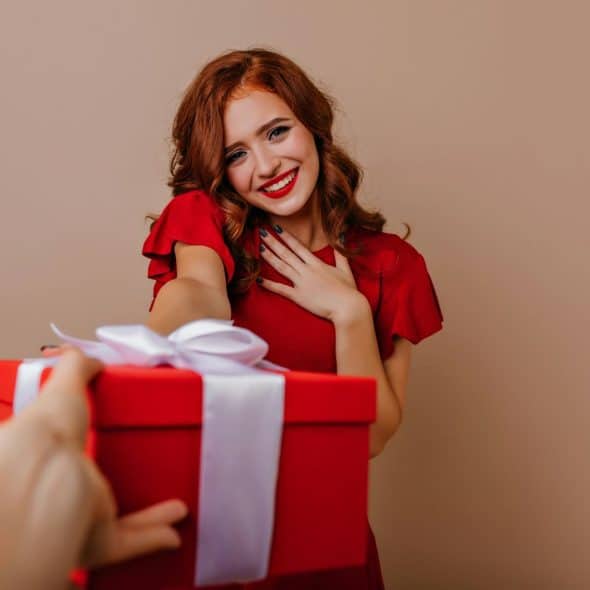 A woman receiving a gift