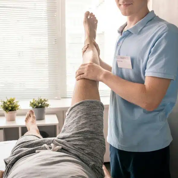 A man having a therapy for his knee.