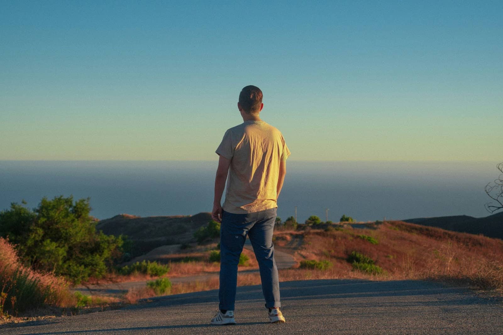 A picture of a man having a poor posture.