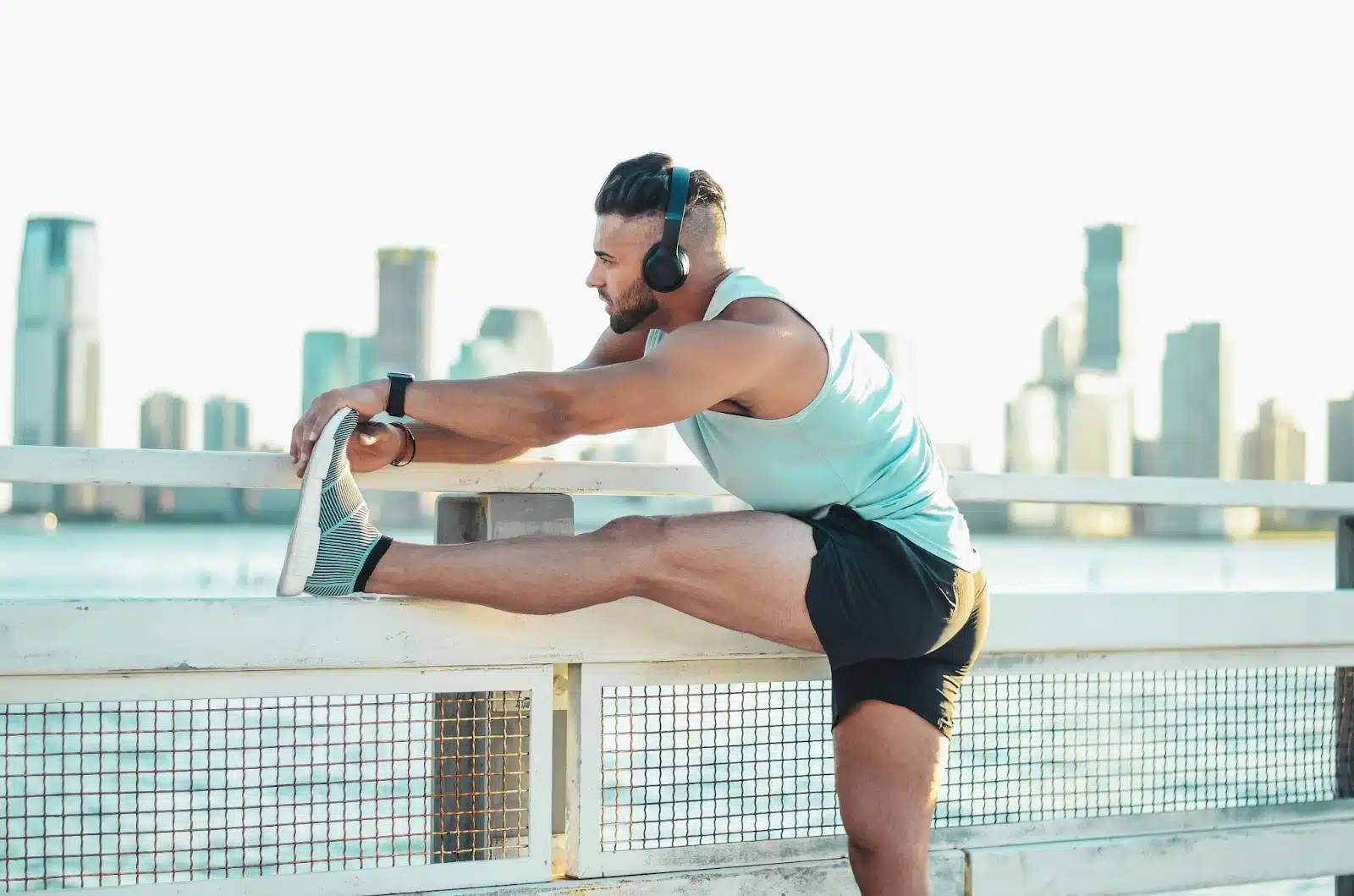 A man stretching his leg.