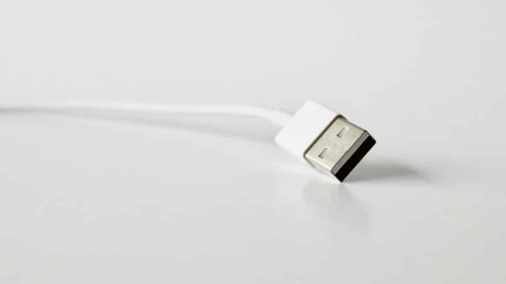 Close-up of white USB cable.