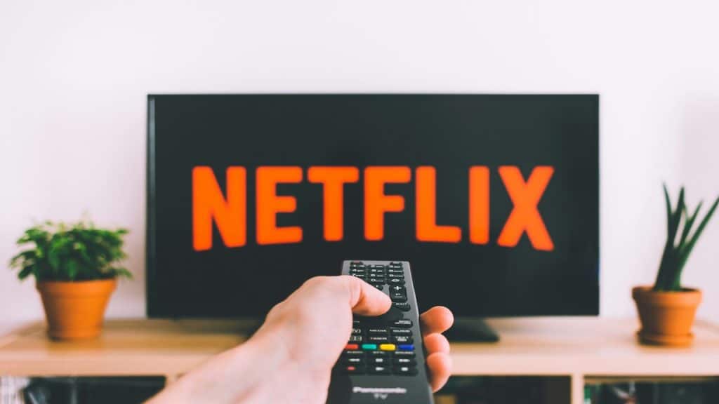 A person holding a remote control.