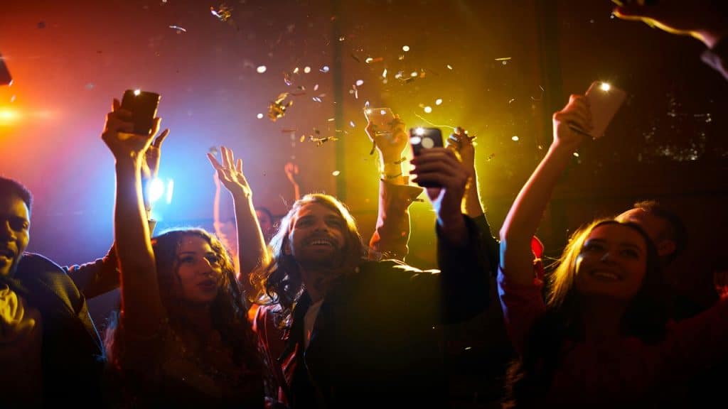A group of friends at a rave.