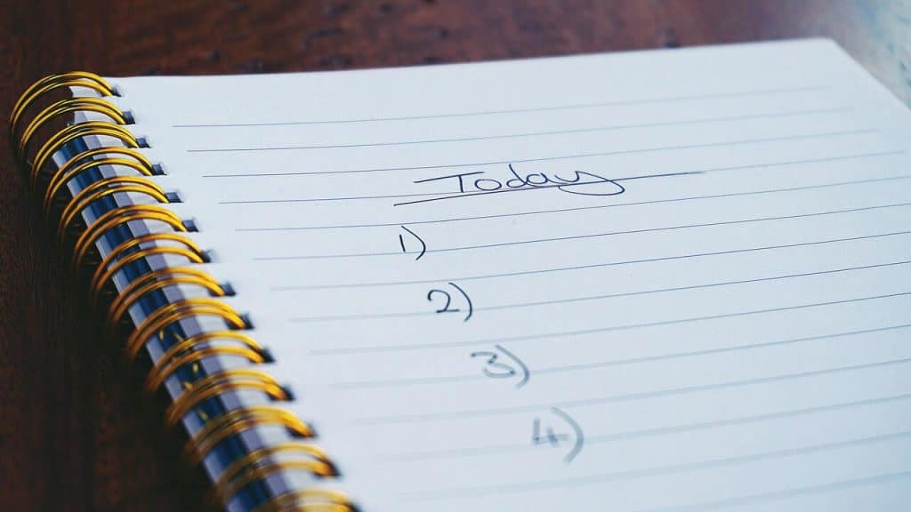 A “today” list on a notebook.