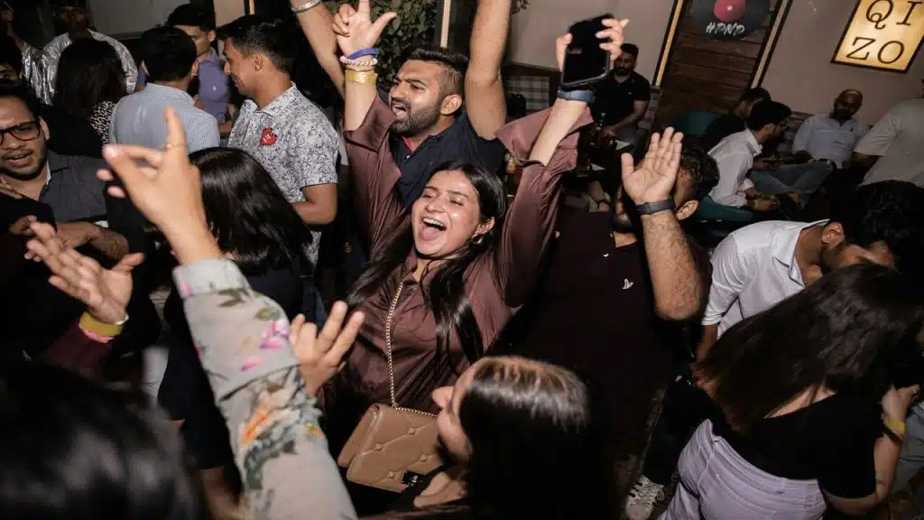 A group of people having fun at a party.
