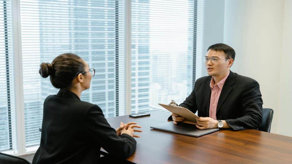 An employee and a boss talking
