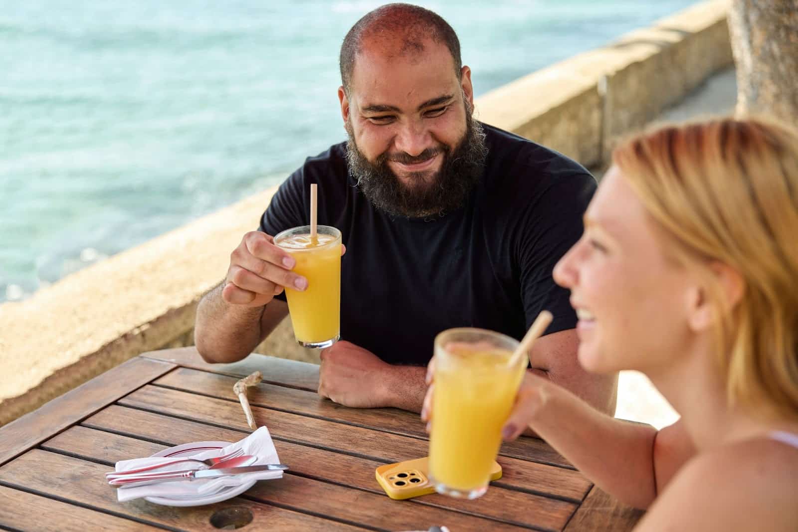 A man having a good time with a woman.