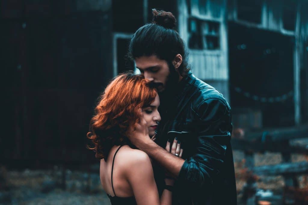 A man hugging a woman to express loyalty