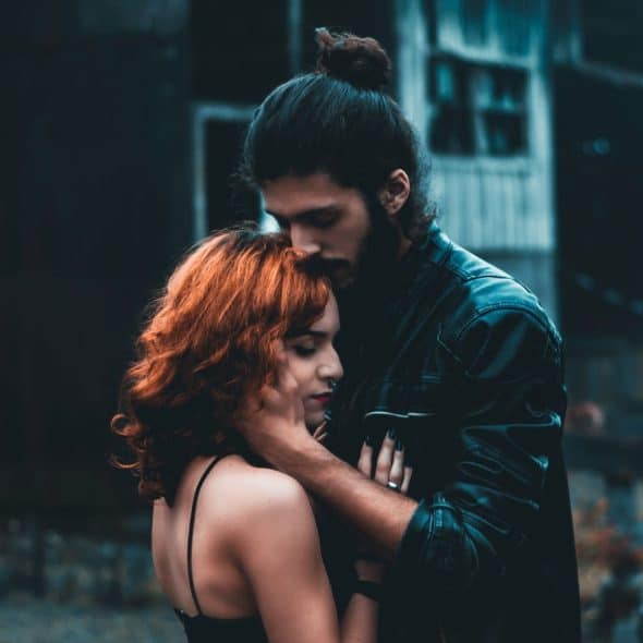 A man hugging a woman to express loyalty