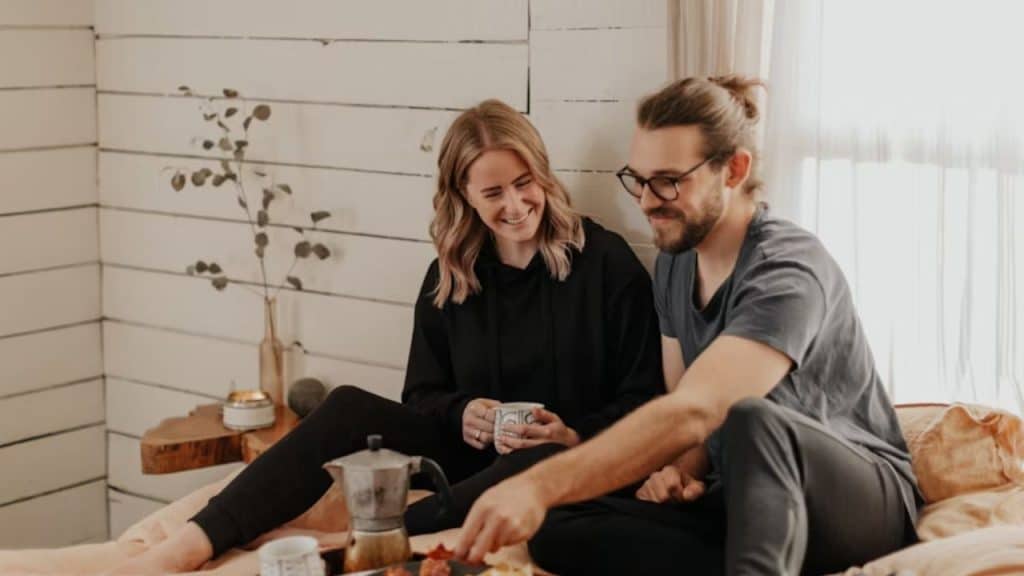 Couple having coffee or dinner together in a calm home setting.