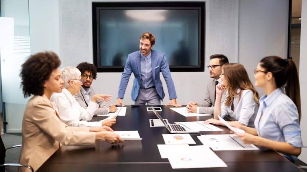 Professional man in leadership role evaluating team relationships.