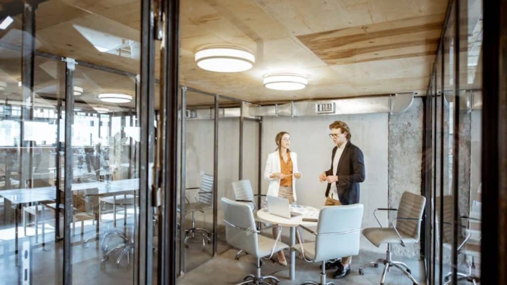 Office couple having a difficult personal talk during a break.