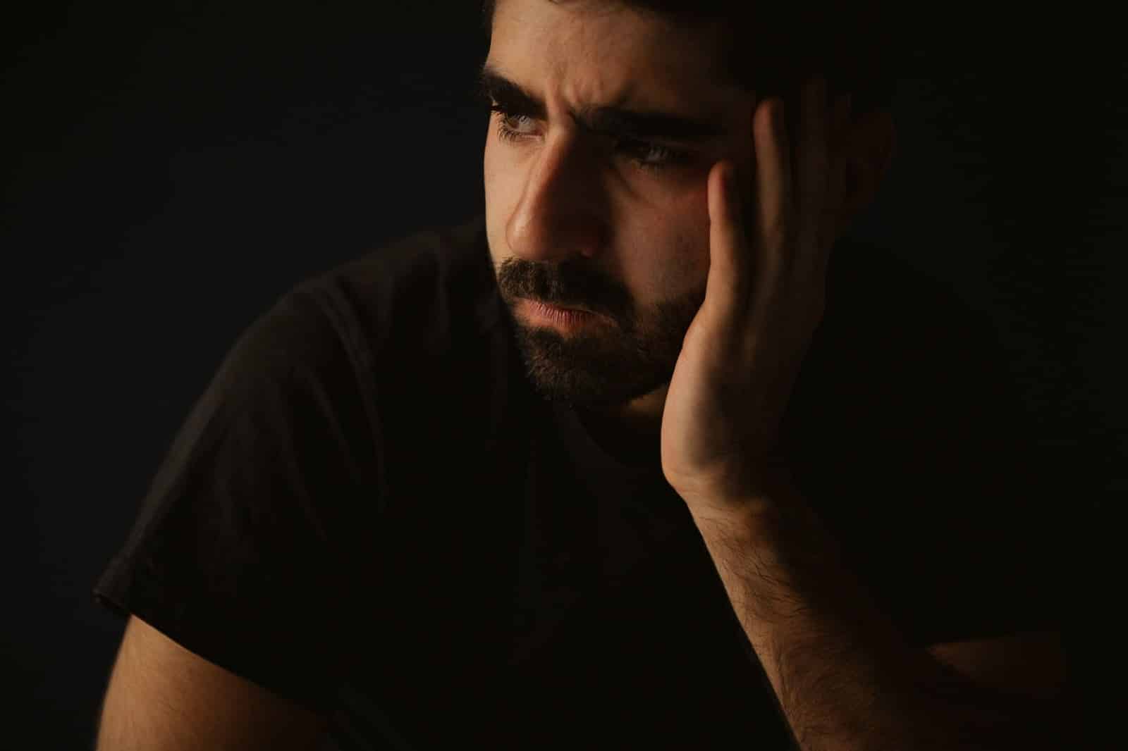 A man looking away.