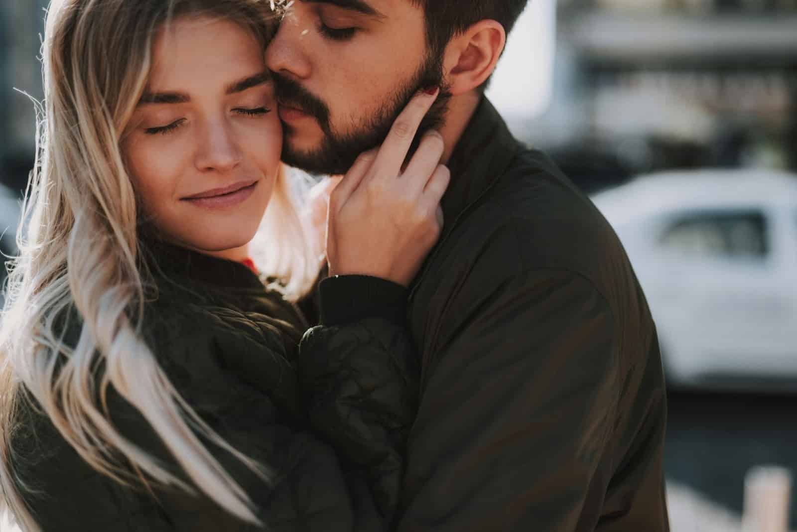 Couple embracing each other.