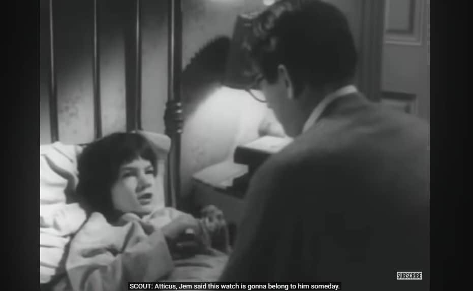 A picture of atticus talking to scout.